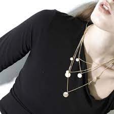 Theia long Dot necklace goldplated
